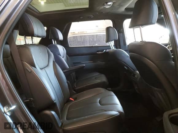 2023 Hyundai Palisade Calligraphy с VIN KM8R74GE7PU611850, выставлен на аукционе Copart как лот 63023794 с пробегом 36 259 миль миль и Списание • Salvage title. История ставок и продаж доступна на DreamBid. Изображение 11.