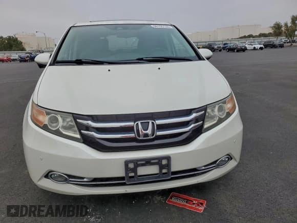 ✅ 2015 Honda Odyssey Touring Elite • VIN: 5FNRL5H94FB104726 • Lot: 96195135. Listed on Copart with 51,594 mi. Free auction sales archive from the USA and detailed vehicle history report at DreamBid. Image 5.