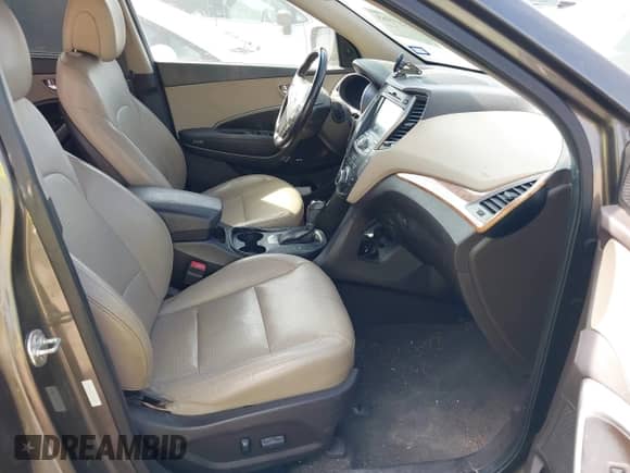 2013 Hyundai Santa Fe Sport z VIN 5XYZW3LA7DG007989, wystawiony jako IAAI lot #42219965 z przebiegiem 131 411 mil mil oraz . Historia ofert i sprzedaży dostępna na DreamBid. Obrazek 5.