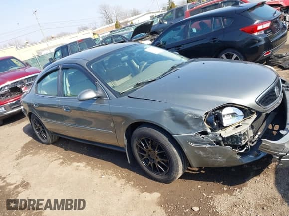 ✅ 2003 Mercury Sable GS • VIN: 1MEFM50243A619761 • Lot: 41790150. Listed on IAAI with 114,522 mi. Free auction sales archive from the USA and detailed vehicle history report at DreamBid. Image 13.