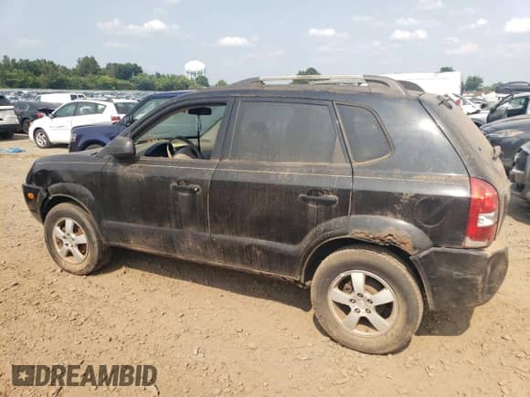 2005 Hyundai Tucson GL z VIN KM8JM12BX5U075930, wystawiony jako Copart lot #67500484 z przebiegiem 141 028 mil mil oraz Szkoda całkowita • Salvage title. Historia ofert i sprzedaży dostępna na DreamBid. Obrazek 2.