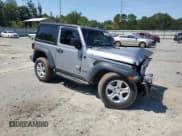 ✅ 2020 Jeep Wrangler Sport S • VIN: 1C4GJXAG8LW215563 • Lot: 70423945. Listed on Copart with 69,559 mi. Free auction sales archive from the USA and detailed vehicle history report at DreamBid. Image 4.