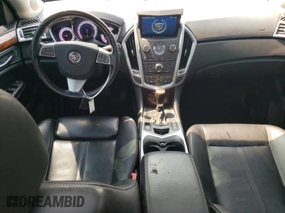 ✅ 2012 Cadillac SRX Performance Collection • VIN: 3GYFNBE31CS509239 • Lot: 47958424. Listed on Copart with 171,067 mi. Free auction sales archive from the USA and detailed vehicle history report at DreamBid. Image 8.