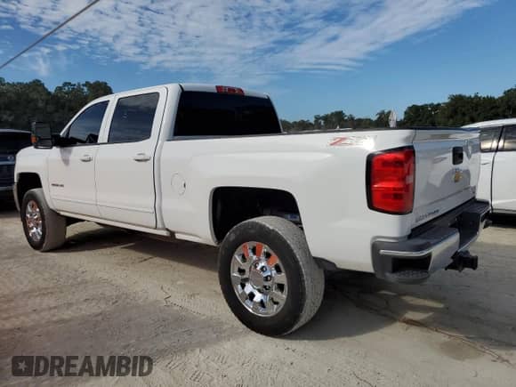 2017 Chevrolet Silverado 2500HD LT с VIN 1GC1KVEY3HF131975, выставлен на аукционе Copart как лот 82115665 с пробегом 299 929 миль миль и Чистый • Clean title. История ставок и продаж доступна на DreamBid. Изображение 2.