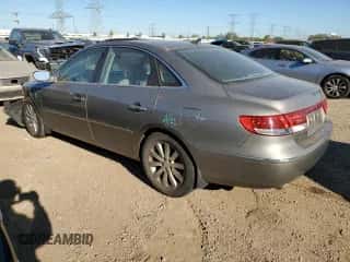 2009 Hyundai Azera Limited z VIN KMHFC46F09A381047, wystawiony jako Copart lot #71802614 z przebiegiem 106 632 mil mil oraz Szkoda całkowita • Salvage title. Historia ofert i sprzedaży dostępna na DreamBid. Obrazek 2.