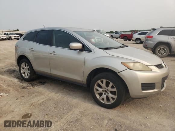 ✅ 2009 Mazda CX-7 Grand Touring • VIN: JM3ER293990219631 • Lot: 59014235. Listed on Copart with 201,523 mi. Free auction sales archive from the USA and detailed vehicle history report at DreamBid. Image 4.