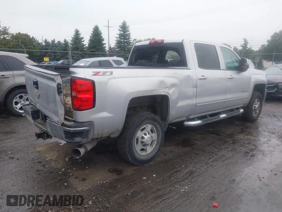 ✅ 2016 Chevrolet Silverado 2500HD LT • VIN: 1GC1KVE8XGF222868 • Lot: 43004596. Listed on IAAI with 93,976 mi. Free auction sales archive from the USA and detailed vehicle history report at DreamBid. Image 4.