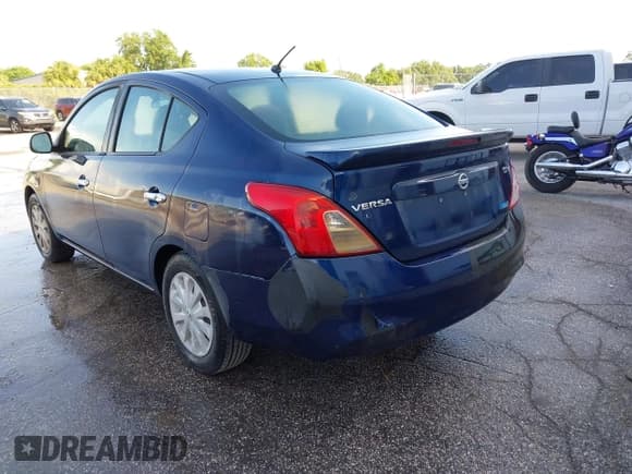 ✅ 2014 Nissan Versa SV • VIN: 3N1CN7APXEK462331 • Lot: 42632302. Listed on IAAI with 105,633 mi. Free auction sales archive from the USA and detailed vehicle history report at DreamBid. Image 6.