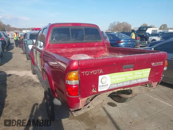 ✅ 2001 Toyota Tacoma PreRunner • VIN: 5TEGN92N11Z755284 • Lot: 43741942. Listed on IAAI with 305,971 mi. Free auction sales archive from the USA and detailed vehicle history report at DreamBid. Image 3.