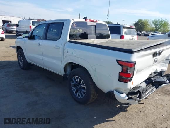 ✅ 2024 Nissan Frontier SV • VIN: 1N6ED1EKXRN665480 • Lot: 42060798. Listed on IAAI with 4,245 mi. Free auction sales archive from the USA and detailed vehicle history report at DreamBid. Image 3.