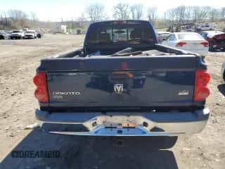 2005 Dodge Dakota z VIN 1D7HW52N15S166830, wystawiony jako Copart lot #78601324 z przebiegiem 126 295 mil mil oraz Nie do naprawy • Non repairable. Historia ofert i sprzedaży dostępna na DreamBid. Obrazek 6.