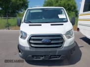 ✅ 2020 Ford Transit Cargo • VIN: 1FTBR1Y86LKA78015 • Lot: 42955243. Listed on IAAI with 80,993 mi. Free auction sales archive from the USA and detailed vehicle history report at DreamBid. Image 12.