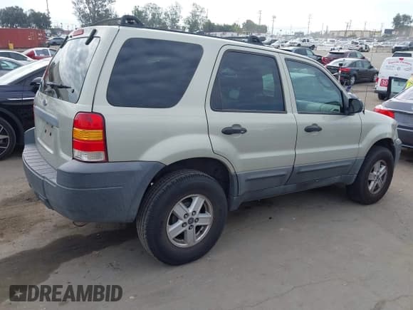 ✅ 2006 Ford Escape XLS • VIN: 1FMYU02Z56KA87003 • Lot: 43252757. Listed on IAAI with 177,223 mi. Free auction sales archive from the USA and detailed vehicle history report at DreamBid. Image 4.