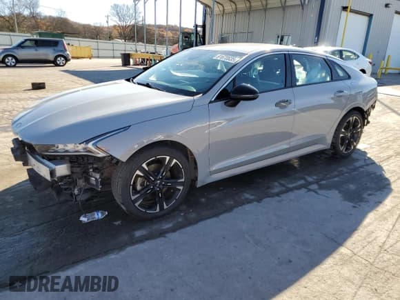 ✅ 2021 Kia K5 GT-Line • VIN: 5XXG64J20MG002873 • Лот: 91670635. Опубликован ранее на Copart с пробегом 94 509 миль. Бесплатный доступ к архиву аукционных продаж из США и подробный отчёт об истории автомобиля на DreamBid. Изображение 1.