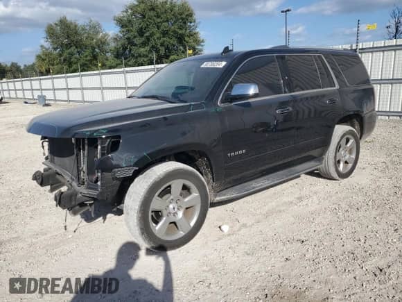 2020 Chevrolet Tahoe Premier z VIN 1GNSCCKC4LR211301, wystawiony jako Copart lot #80788204 z przebiegiem 64 700 mil mil oraz Szkoda całkowita • Salvage title. Historia ofert i sprzedaży dostępna na DreamBid. Obrazek 1.