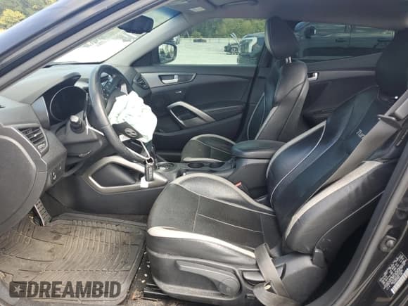 ✅ 2013 Hyundai Veloster Turbo • VIN: KMHTC6AE1DU143762 • Lot: 71797174. Wystawiony na Copart z przebiegiem 162 405 mil. Bezpłatny archiwum sprzedaży aukcyjnych z USA i szczegółowy raport historii pojazdu na DreamBid. Zdjęcie 7.