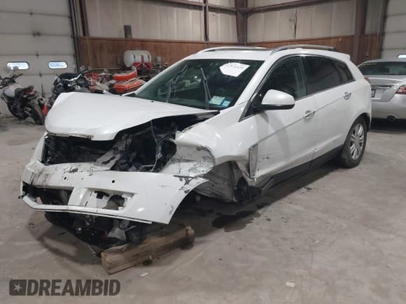 ✅ 2015 Cadillac SRX Luxury Collection • VIN: 3GYFNEE31FS568118 • Lot: 42331529. Wystawiony na IAAI z przebiegiem 114 914 mil. Bezpłatny archiwum sprzedaży aukcyjnych z USA i szczegółowy raport historii pojazdu na DreamBid. Zdjęcie 18.