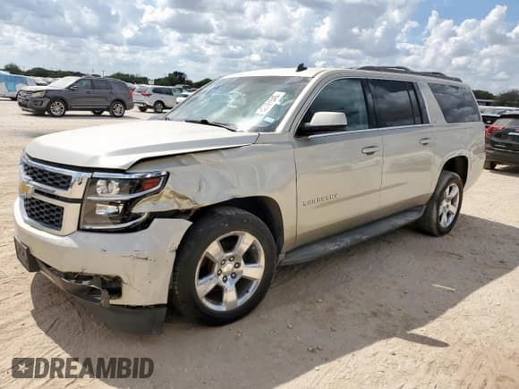 ✅ 2015 Chevrolet Suburban LT • VIN: 1GNSCJKCXFR297559 • Лот: 82297545. Опубликован ранее на Copart с пробегом 141 276 миль. Бесплатный доступ к архиву аукционных продаж из США и подробный отчёт об истории автомобиля на DreamBid. Изображение 1.