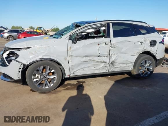 ✅ 2023 Kia Sportage SX • VIN: 5XYK43AF3PG127637 • Lot: 43442571. Listed on IAAI with Not provided. Free auction sales archive from the USA and detailed vehicle history report at DreamBid. Image 6.