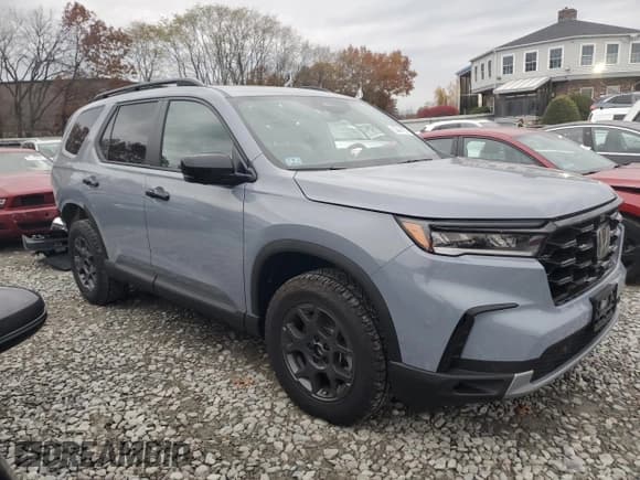 ✅ 2025 Honda Pilot TrailSport • VIN: 5FNYG1H6XSB160050 • Лот: 90994185. Опубликован ранее на Copart с пробегом 1 521 миль. Бесплатный доступ к архиву аукционных продаж из США и подробный отчёт об истории автомобиля на DreamBid. Изображение 4.