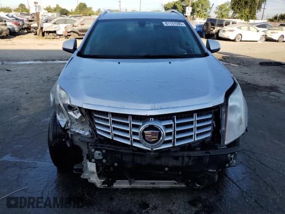 ✅ 2016 Cadillac SRX Performance Collection • VIN: 3GYFNCE34GS576431 • Lot: 81131595. Listed on Copart with 92,943 mi. Free auction sales archive from the USA and detailed vehicle history report at DreamBid. Image 5.