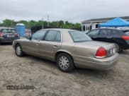 ✅ 2003 Ford Crown Victoria LX • VIN: 2FAHP74W33X103754 • Lot: 55881315. Listed on Copart with 132,368 mi. Free auction sales archive from the USA and detailed vehicle history report at DreamBid. Image 2.