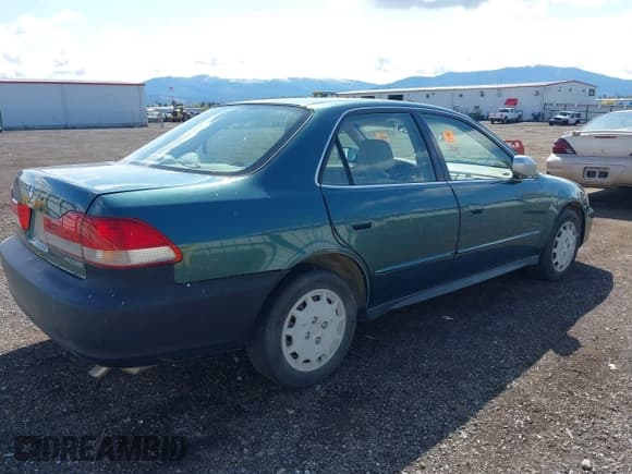 ✅ 2002 Honda Accord LX • VIN: JHMCG56462C030457 • Lot: 42082548. Listed on IAAI with 254,994 mi. Free auction sales archive from the USA and detailed vehicle history report at DreamBid. Image 4.