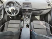 ✅ 2014 Mazda CX-5 Touring • VIN: JM3KE4CY5E0384536 • Лот: 81885155. Опубликован ранее на Copart с пробегом 62 415 миль. Бесплатный доступ к архиву аукционных продаж из США и подробный отчёт об истории автомобиля на DreamBid. Изображение 8.