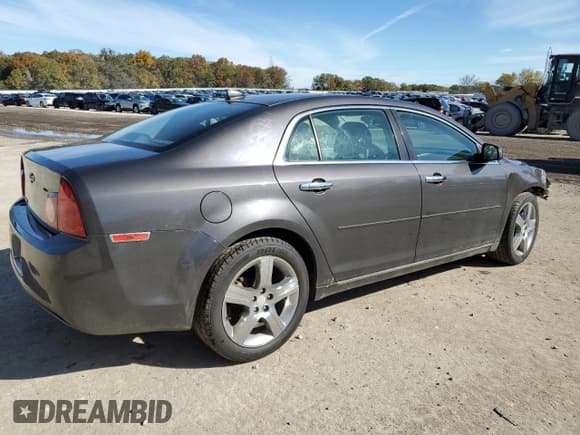 ✅ 2012 Chevrolet Malibu 1LT • VIN: 1G1ZC5E02CF252721 • Lot: 76123524. Listed on Copart with 128,087 mi. Free auction sales archive from the USA and detailed vehicle history report at DreamBid. Image 3.