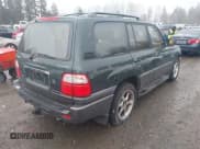 ✅ 2000 Lexus LX 470 • VIN: JT6HT00W3Y0124104 • Lot: 41493749. Listed on IAAI with 253,161 mi. Free auction sales archive from the USA and detailed vehicle history report at DreamBid. Image 4.