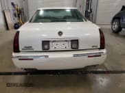 ✅ 1998 Cadillac Eldorado Touring • VIN: 1G6ET1291TU618488 • Lot: 65851485. Listed on Copart with 120,718 mi. Free auction sales archive from the USA and detailed vehicle history report at DreamBid. Image 6.