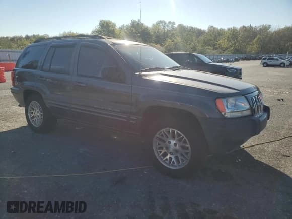 ✅ 2004 Jeep Grand Cherokee Limited • VIN: 1J8GW58N14C289493 • Lot: 86095035. Listed on Copart with 273,090 mi. Free auction sales archive from the USA and detailed vehicle history report at DreamBid. Image 4.