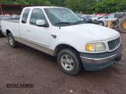 ✅ 2000 Ford F-150 XL • VIN: 2FTRX17L3YCA03228 • Lot: 42262388. Listed on IAAI with 122,929 mi. Free auction sales archive from the USA and detailed vehicle history report at DreamBid. Image 1.