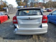 ✅ 2009 Dodge Caliber SXT • VIN: 1B3HB48A79D222768 • Лот: 90278195. Опубликован ранее на Copart с пробегом Не указан. Бесплатный доступ к архиву аукционных продаж из США и подробный отчёт об истории автомобиля на DreamBid. Изображение 6.