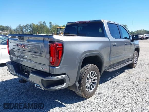 ✅ 2021 GMC Sierra 1500 AT4 • VIN: 1GTU9EET0MZ135164 • Лот: 42809104. Опубликован ранее на IAAI с пробегом 92 510 миль. Бесплатный доступ к архиву аукционных продаж из США и подробный отчёт об истории автомобиля на DreamBid. Изображение 4.