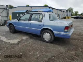 ✅ 1991 Plymouth Acclaim • VIN: 1P3XA4633MF523214 • Lot: 55908665. Wystawiony na Copart z przebiegiem 90 332 mil. Bezpłatny archiwum sprzedaży aukcyjnych z USA i szczegółowy raport historii pojazdu na DreamBid. Zdjęcie 2.