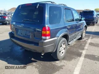 ✅ 2003 Ford Escape XLT Popular 2 • VIN: 1FMCU93153KB79232 • Лот: 43492841. Опубликован ранее на IAAI с пробегом 188 309 миль. Бесплатный доступ к архиву аукционных продаж из США и подробный отчёт об истории автомобиля на DreamBid. Изображение 4.