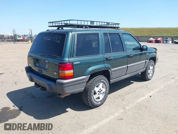 ✅ 1995 Jeep Grand Cherokee Laredo • VIN: 1J4GZ58Y2SC669152 • Lot: 42077067. Listed on IAAI with 134,022 mi. Free auction sales archive from the USA and detailed vehicle history report at DreamBid. Image 4.