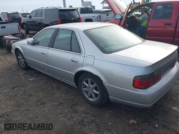 ✅ 2002 Cadillac Seville Touring STS • VIN: 1G6KY54902U102873 • Lot: 39710788. Wystawiony na IAAI z przebiegiem 120 116 mil. Bezpłatny archiwum sprzedaży aukcyjnych z USA i szczegółowy raport historii pojazdu na DreamBid. Zdjęcie 3.
