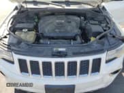 ✅ 2015 Jeep Grand Cherokee Overland • VIN: 1C4RJFCM4FC618516 • Lot: 58671455. Wystawiony na Copart z przebiegiem 221 550 mil. Bezpłatny archiwum sprzedaży aukcyjnych z USA i szczegółowy raport historii pojazdu na DreamBid. Zdjęcie 12.