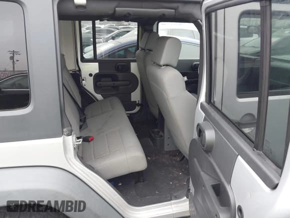 ✅ 2008 Jeep Wrangler Unlimited Rubicon • VIN: 1J4GA69118L616014 • Лот: 43740634. Опубликован ранее на IAAI с пробегом 144 936 миль. Бесплатный доступ к архиву аукционных продаж из США и подробный отчёт об истории автомобиля на DreamBid. Изображение 8.