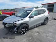 ✅ 2017 Nissan Rogue SV • VIN: JN8AT2MT7HW380107 • Lot: 43618034. Listed on IAAI with 99,472 mi. Free auction sales archive from the USA and detailed vehicle history report at DreamBid. Image 2.