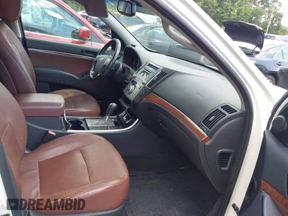 2012 Hyundai Veracruz Limited с VIN KM8NUDCC1CU184977, выставлен на аукционе IAAI как лот 42854607 с пробегом 169 898 миль миль и . История ставок и продаж доступна на DreamBid. Изображение 5.