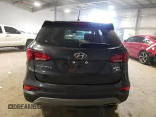 ✅ 2018 Hyundai Santa Fe 2.4L • VIN: 5XYZTDLB8JG566132 • Лот: 53576853. Опубликован ранее на Copart с пробегом 30 589 миль. Бесплатный доступ к архиву аукционных продаж из США и подробный отчёт об истории автомобиля на DreamBid. Изображение 6.