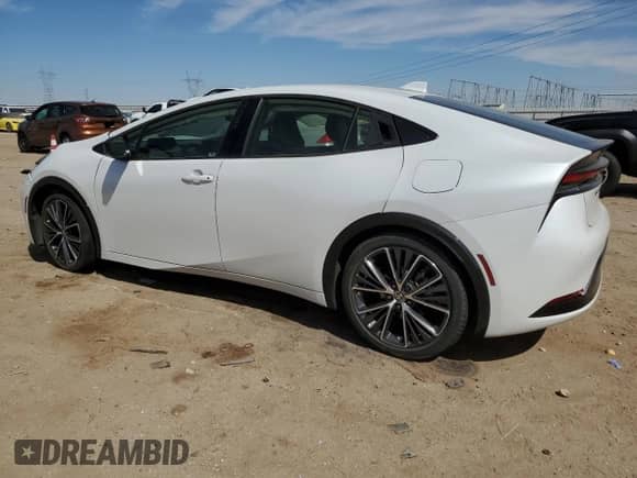 2024 Toyota Prius LE with VIN JTDACAAUXR3030010, listed as a Copart auction lot 69868615 with 22,790 mi miles and Salvage title. Bid and sale history available at DreamBid. Image 2.