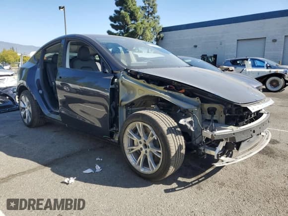 ✅ 2024 Tesla Model Y • VIN: 7SAYGDED5RF097313 • Lot: 91060415. Wystawiony na Copart z przebiegiem 26 346 mil. Bezpłatny archiwum sprzedaży aukcyjnych z USA i szczegółowy raport historii pojazdu na DreamBid. Zdjęcie 4.