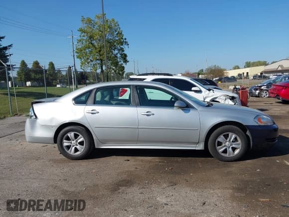 ✅ 2014 Chevrolet Impala LS • VIN: 2G1WA5E35E1173671 • Lot: 43320026. Listed on IAAI with 159,547 mi. Free auction sales archive from the USA and detailed vehicle history report at DreamBid. Image 13.