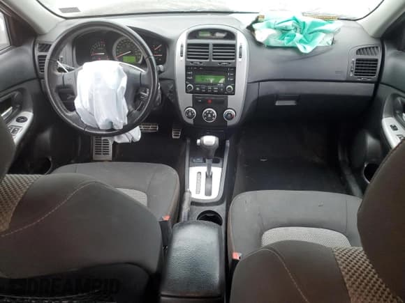 ✅ 2009 Kia Spectra EX • VIN: KNAFE222795027263 • Lot: 93812205. Listed on Copart with 164,002 mi. Free auction sales archive from the USA and detailed vehicle history report at DreamBid. Image 8.