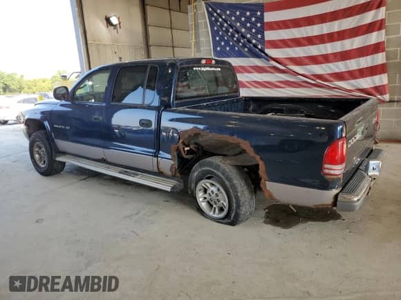 2000 Dodge Dakota Sport with VIN 1B7GG2AN8YS722350, listed as a Copart auction lot 69377984 with 199,883 mi miles and Salvage title. Bid and sale history available at DreamBid. Image 2.