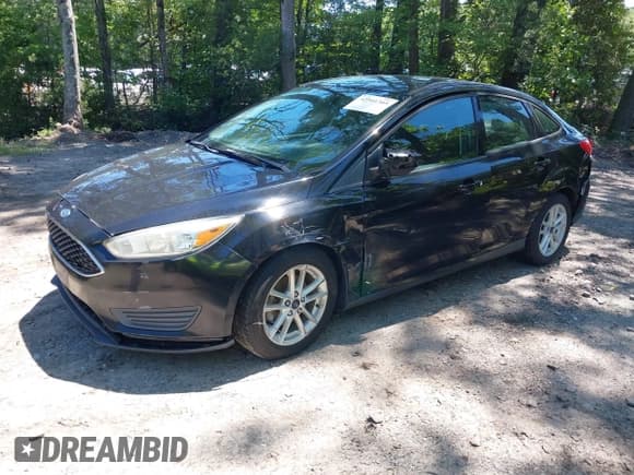 ✅ 2016 Ford Focus SE • VIN: 1FADP3F28GL286685 • Lot: 42541303. Wystawiony na IAAI z przebiegiem 92 135 mil. Bezpłatny archiwum sprzedaży aukcyjnych z USA i szczegółowy raport historii pojazdu na DreamBid. Zdjęcie 2.